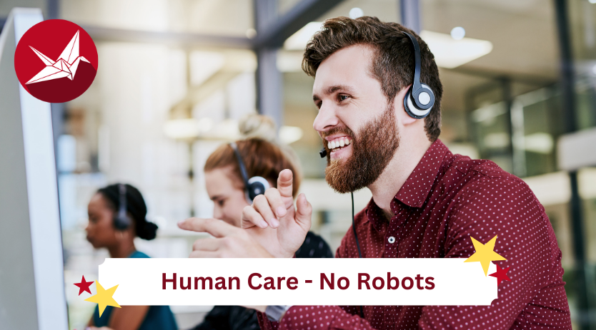Sendico support staff happily smiling at their computer screen while serving customers with the words Human Care - No Robots on the bottom banner