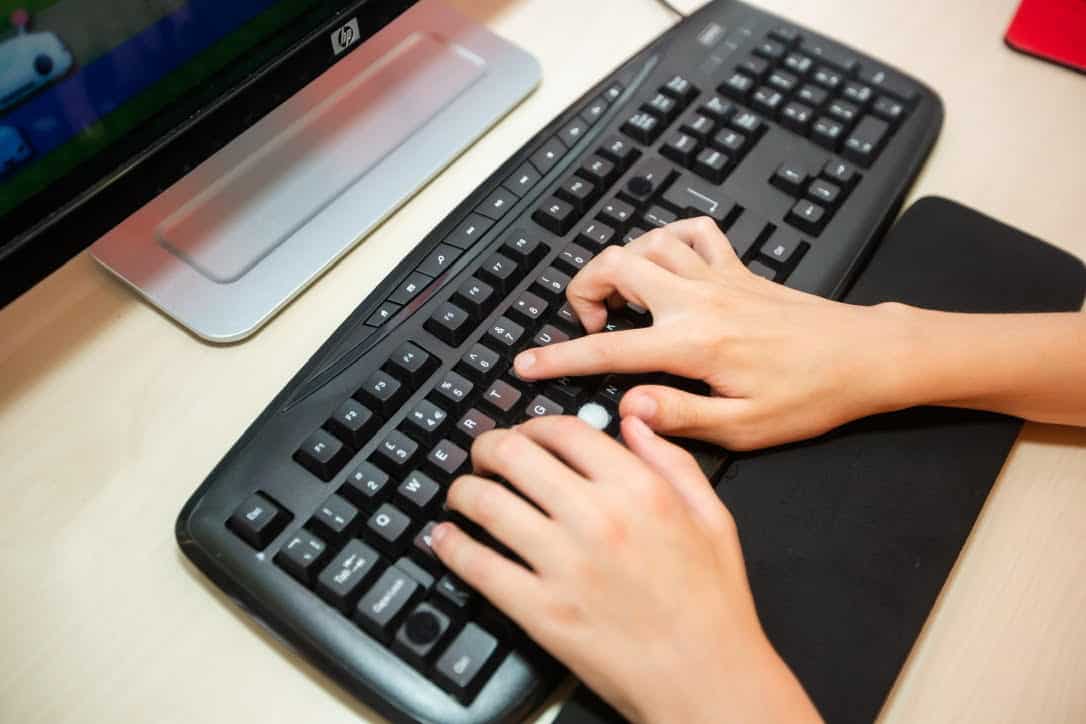 Tutor-supported online touch typing programme for children and adults