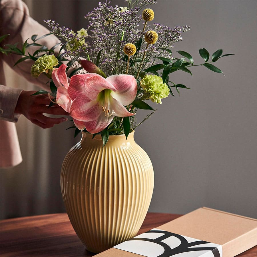 Blombruket bukett med prisvinnande kartong