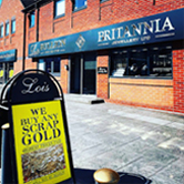 The inviting storefront of Lois Bullion, a trusted precious metals dealer in Birmingham's Jewellery Quarter.